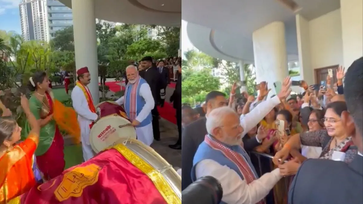 pm-modi-tries-his-hands-at-dhol-in-singapore-after-indian-diaspora-gives-him-rousing-welcome-watch